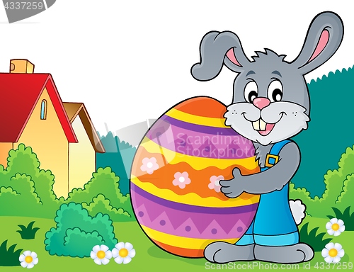 Image of Bunny holding big Easter egg theme 4