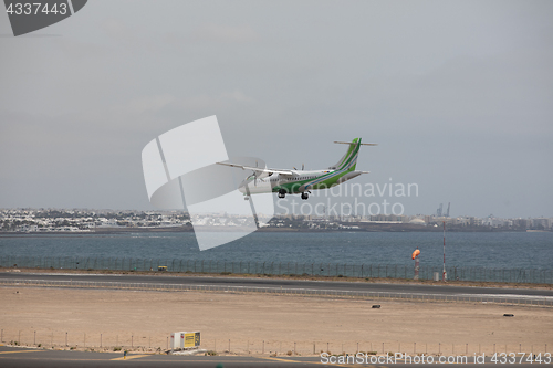 Image of ARECIFE, SPAIN - APRIL, 15 2017: ATR 72 of Binter landing at Lan