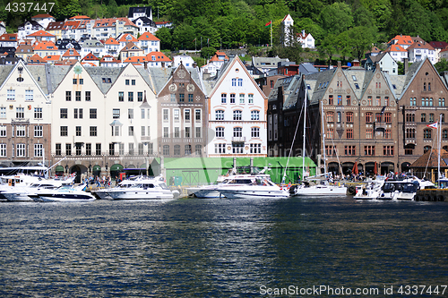 Image of BERGEN HARBOR, NORWAY - MAY 27, 2017: Private boats on a row alo