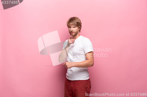 Image of Portrait of young man with happy facial expression