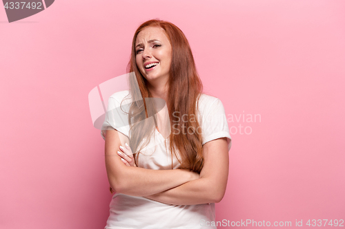 Image of Portrait of young woman with happy facial expression