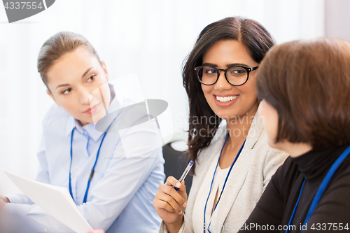 Image of businesswomen at international business conference