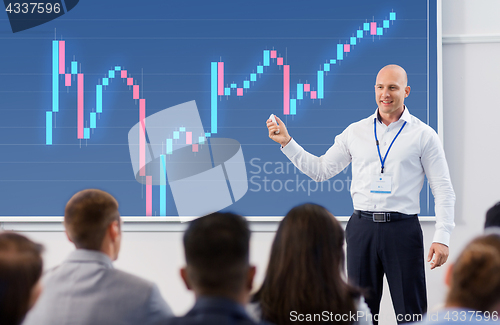 Image of group of people at business conference or lecture