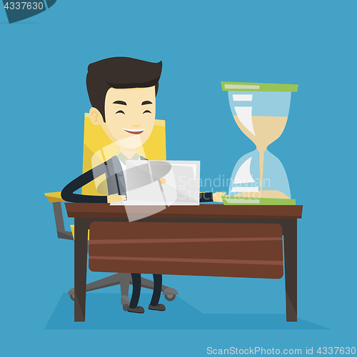 Image of Asian business man working in office.