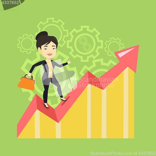 Image of Happy business woman standing on profit chart.