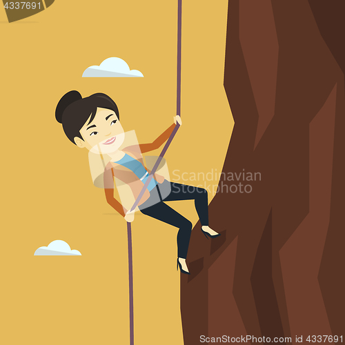 Image of Business woman climbing on the mountain.