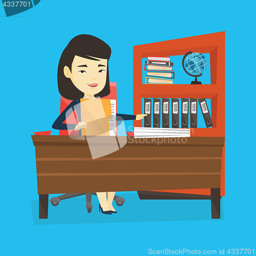 Image of Office worker working with documents.