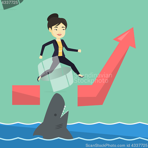 Image of Business woman jumping over ocean with shark.