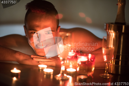 Image of man relaxing in the jacuzzi