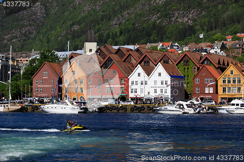 Image of BERGEN HARBOR, NORWAY - MAY 27, 2017: Private boats on a row alo