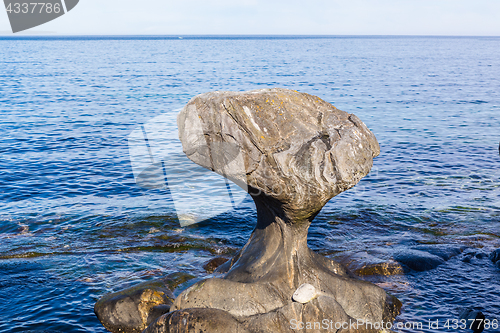 Image of Kannesteinen is a special shaped stone located on the shore of O