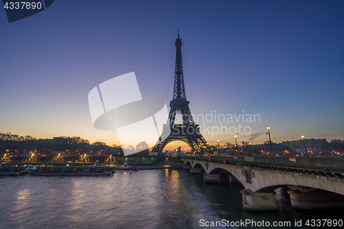 Image of The Eiffel tower at sunrise in Paris