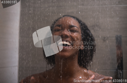 Image of African American woman in the shower