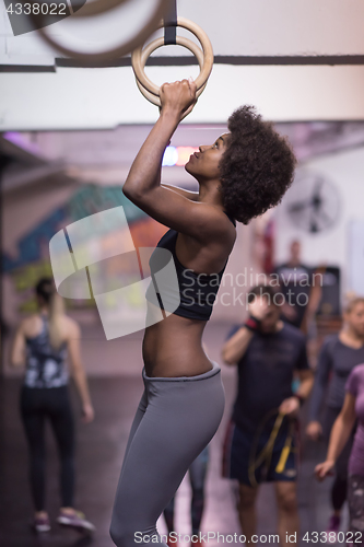 Image of black woman doing dipping exercise