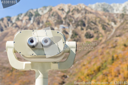 Image of Binocular viewer with beautiful landscape