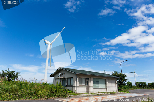 Image of Wind turbines with blue sky