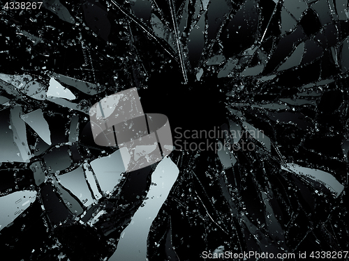 Image of Pieces of destructed Shattered glass on black 