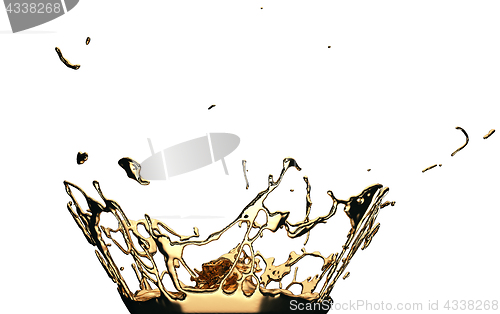 Image of Liquid gold or oil splatter and splashes isolated on white