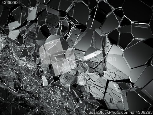 Image of Pieces of destructed Shattered glass on black