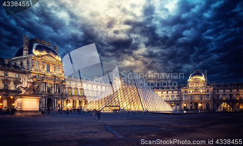 Image of View of famous Louvre Museum with Louvre Pyramid