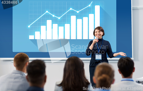 Image of group of people at business conference or lecture