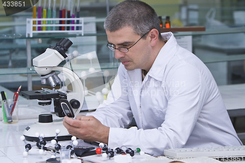 Image of Researcher checking his mobile phone