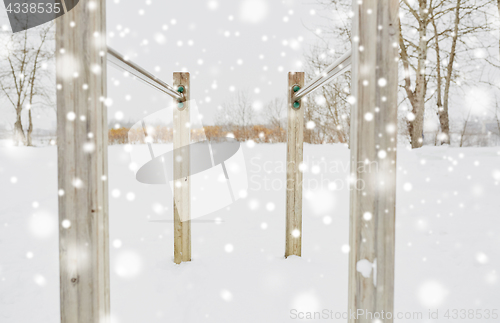 Image of parallel bars outdoors in winter