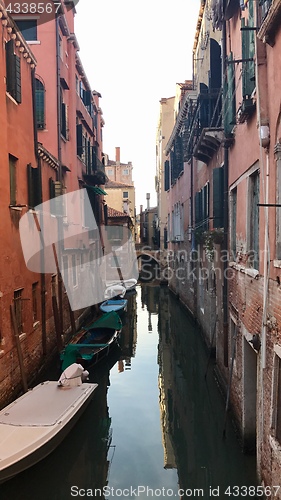 Image of Gondolier in the small canals of Venice, Italy