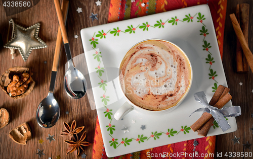 Image of Cup of coffee and Christmas decorations 