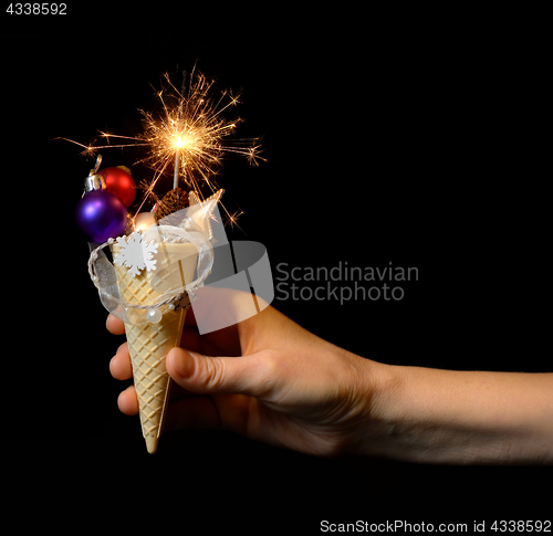 Image of Ice cream cone and christmas decoration