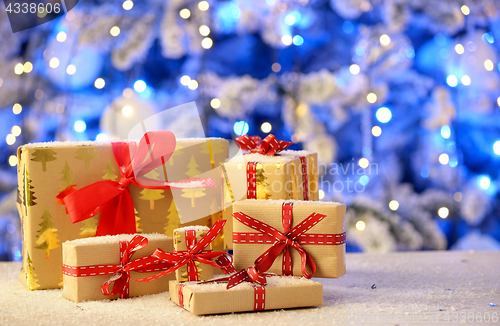 Image of Christmas gifts on table 