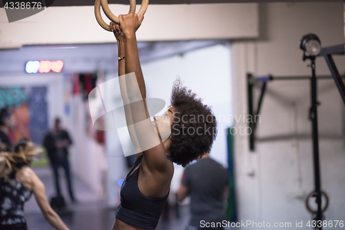 Image of black woman doing dipping exercise