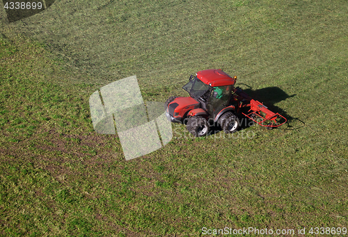 Image of Small tractor in a field