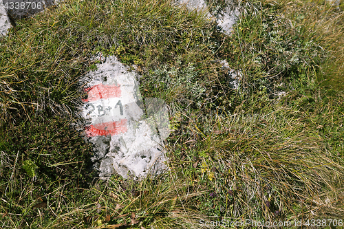 Image of Trail marker for hikers on a sunny day