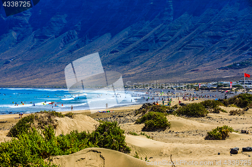 Image of Surfers beach Famara on Lanzarote always has a red flag.