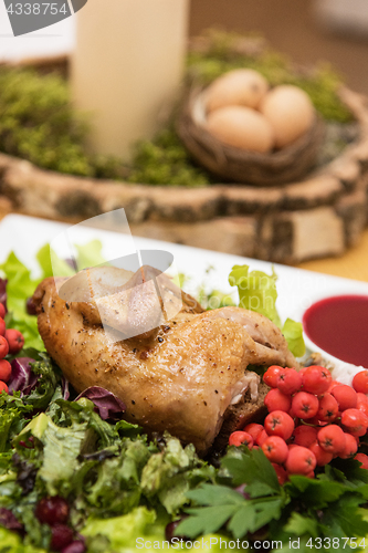 Image of quail roasted with sweet and sour cranberry sauce