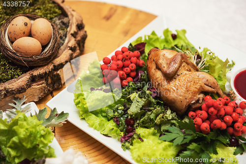 Image of quail roasted with sweet and sour cranberry sauce