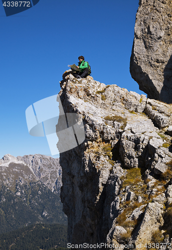 Image of Tourist on a cliff