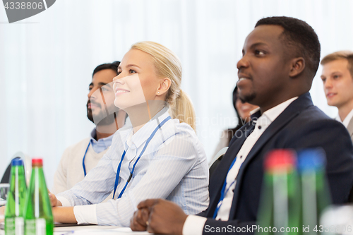 Image of happy business team at international conference