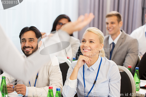 Image of group of people at business conference or lecture