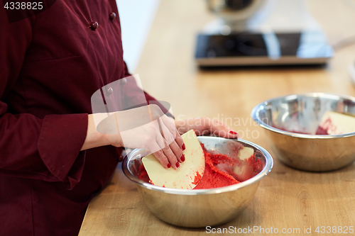 Image of chef making macaron batter at confectionery