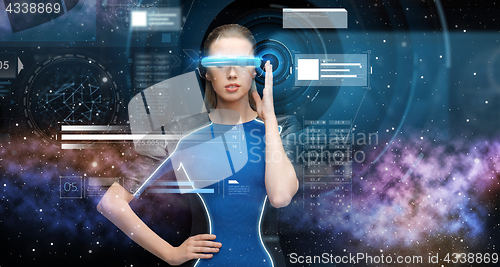 Image of woman in virtual reality 3d glasses with charts