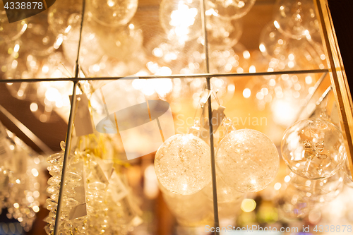 Image of close up of christmas decorations at shop window