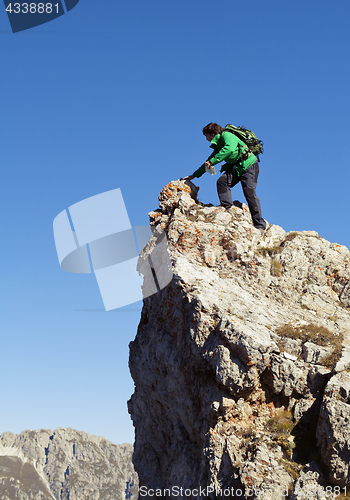 Image of Tourist on a cliff