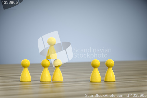 Image of game figures building a pyramid