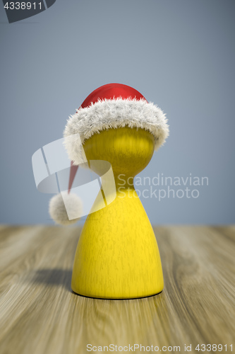 Image of a red christmas hat on a yellow game figure