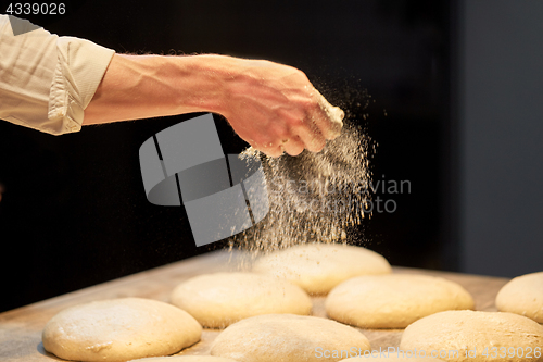 Image of chef or baker making bread dough at bakery