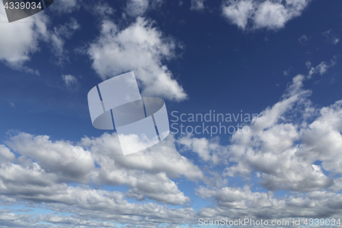 Image of Blue skies with white puffy clouds