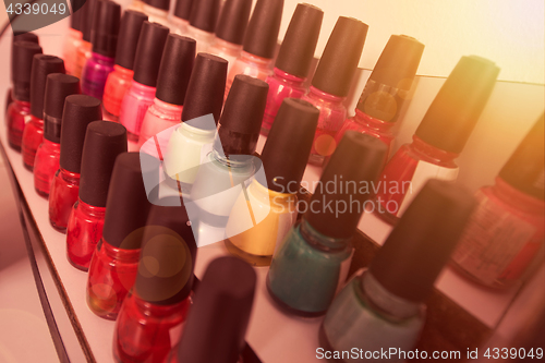 Image of Set of different bottles of nail polish