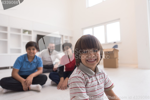 Image of portrait of happy young boys with their dad